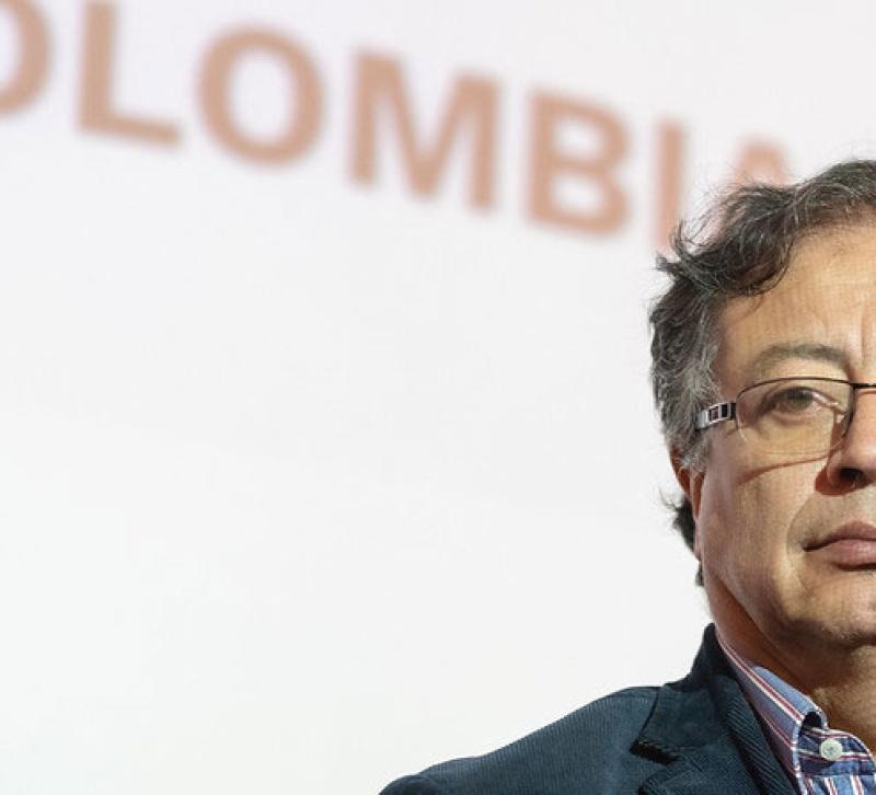 Gustavo Petro with the word Colombia in the background