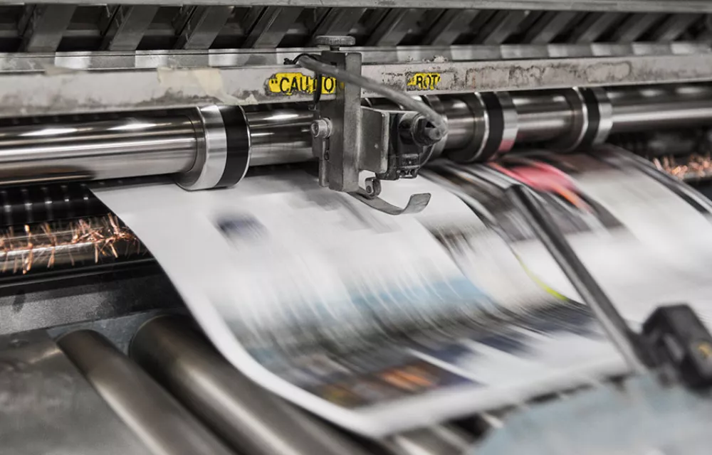 A newspaper on a printing press