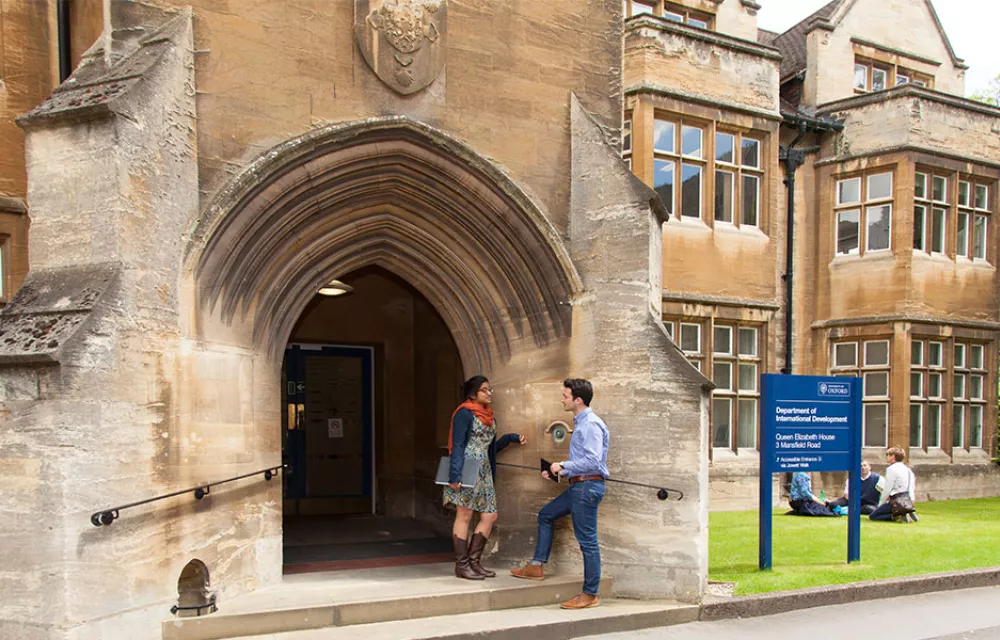 Two students standing in the doorway at ODID