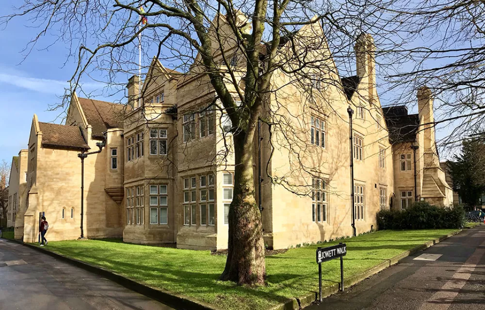 The ODID building in sunshine with a tree in the foreground