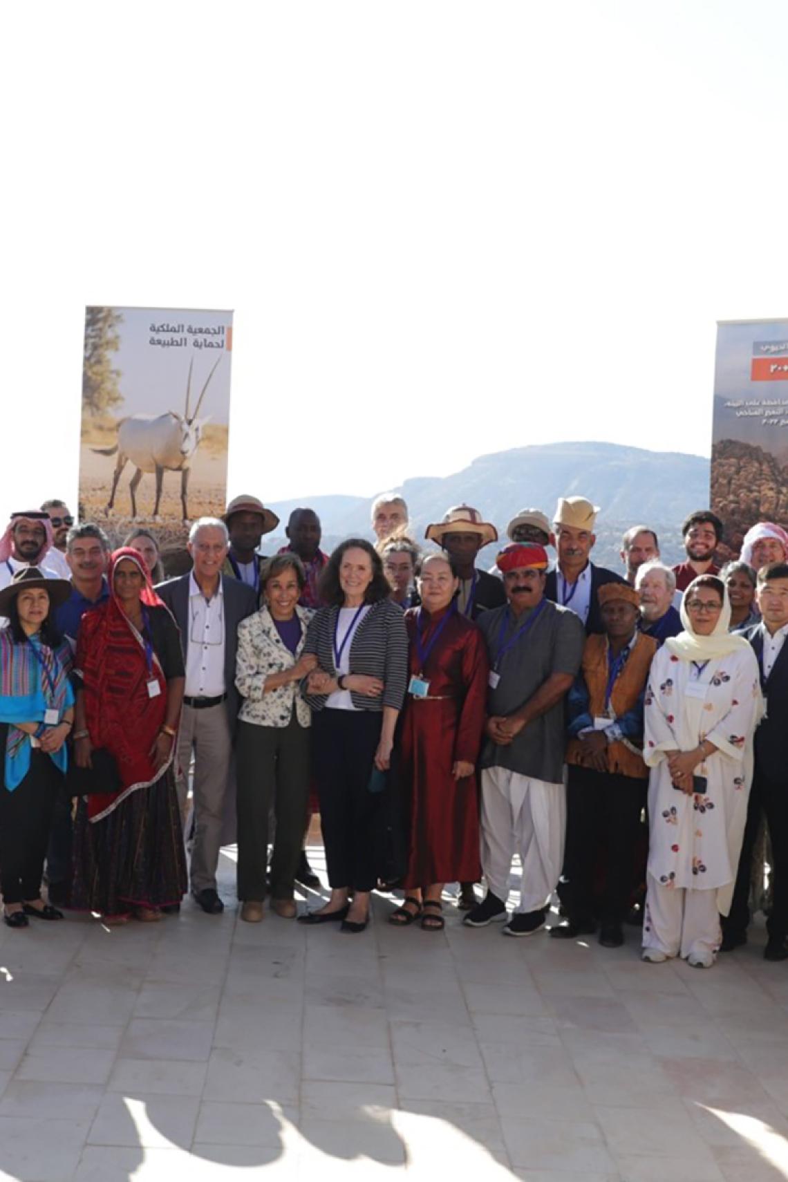 Dana +20 group photo of Mobile Peoples delegates and participants with HRH Princess Basma bint Talal