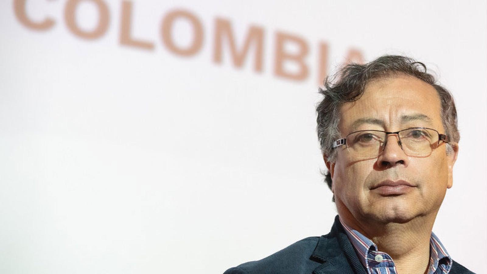 Gustavo Petro with the word Colombia in the background